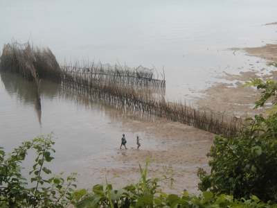 children fishing in the creek