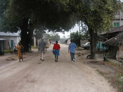 Tom James and Lyn entering Mnarani Village